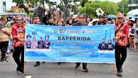 Miniatur Rumah Betang Jadi Simbol Sinergi Pembangunan pada Mobil Hias Bapperida Kalteng di FBIM 2026